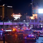 Las Vegas Metro Police and medical workers stage in the intersection of Tropicana Avenue and Las Vegas Boulevard South after a mass shooting at a music festival on the Las Vegas Strip Sunday, Oct. 1, 2017. (AP Photo / Las Vegas Sun, Steve Marcus)