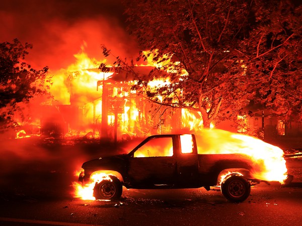 Coffey Park homes burn early Monday Oct. 9, 2017 in Santa Rosa. (Kent Porter / The Press Democrat)