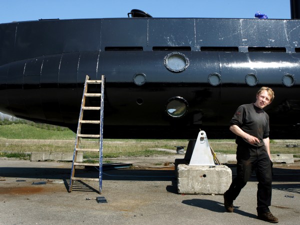 FILE - The Danish navy says it is searching for a nearly 18-meter-long (59.4-feet), 40-ton privately built submarine in the waters off Copenhagen with at least two people onboard. The submarine and the owner Peter Madsen is seen in this April 30 2008 file photo. (Niels Hougaard/AP via Ritzau FILE)  DENMARK OUT