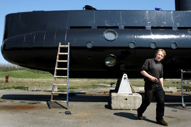 FILE - The Danish navy says it is searching for a nearly 18-meter-long (59.4-feet), 40-ton privately built submarine in the waters off Copenhagen with at least two people onboard. The submarine and the owner Peter Madsen is seen in this April 30 2008 file photo. (Niels Hougaard/AP via Ritzau FILE)  DENMARK OUT