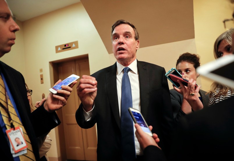 Senate Intelligence Committee Vice Chairman Sen. Mark Warner, D-Va., speaks with reporters on Capitol Hill in Washington, Wednesday, Sept. 27, 2017. (AP Photo/Pablo Martinez Monsivais)