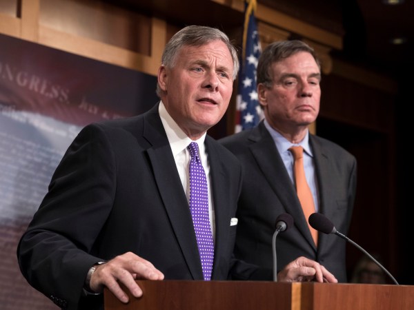 Senate Select Committee on Intelligence Chairman Richard Burr, R-N.C., left, and Vice Chairman Mark Warner, D-Va., update reporters on the status of their inquiry into Russian interference in the 2016 U.S. elections, at the Capitol in Washington, Wednesday, Oct. 4, 2017. Burr says the committee has interviewed more than 100 witnesses as part of its investigation and that more work still needs to be done.  (AP Photo/J. Scott Applewhite)