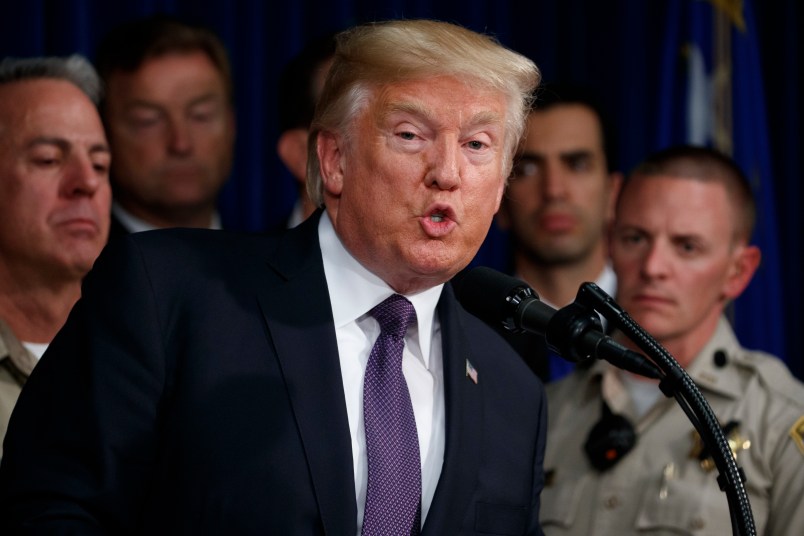 President Donald Trump speaks after meeting with first responders and private citizens that helped during the mass shooting, during a "Hero's Meet and Greet" at the Las Vegas Metropolitan Police Department, Wednesday, Oct. 4, 2017, in Las Vegas. (AP Photo/Evan Vucci)