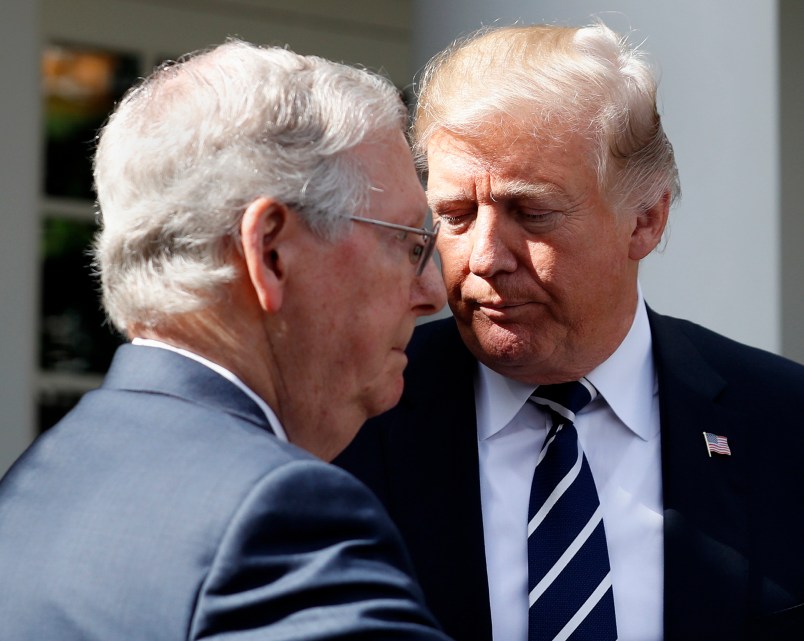 President Donald Trump speaks as he stands next Senate Majority Leader Mitch McConnell of Ky., after their meeting at the White House, Monday, Oct. 16, 2017, in Washington. (AP Photo/Alex Brandon)