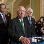 Senate Majority Leader Mitch McConnell, R-Ky., flanked by Sen. John Thune, R-S.D., left, and Majority Whip John Cornyn, R-Texas, announces to reporters that the Senate is moving ahead on a Republican budget plan, a critical step in President Donald Trump and the party's politically imperative drive to cut taxes and simplify the IRS code, at the Capitol in Washington, Tuesday, Oct. 17, 2017.  (AP Photo/J. Scott Applewhite)