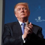 President Donald Trump applauds members of the audience before speaking at the Heritage Foundation's annual President's Club meeting, Tuesday, Oct. 17, 2017 in Washington. (AP Photo/Pablo Martinez Monsivais)