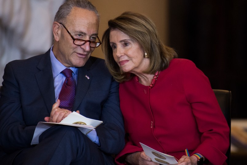 UNITED STATES - OCTOBER 25: Senate Minority Leader Charles Schumer, D-N.Y., and House Minority Leader Nancy Pelosi, D-Calif., attend a Congressional Gold Medal ceremony in in Emancipation Hall to honor Filipino veterans of World War II on October 25, 2017. (Photo By Tom Williams/CQ Roll Call)