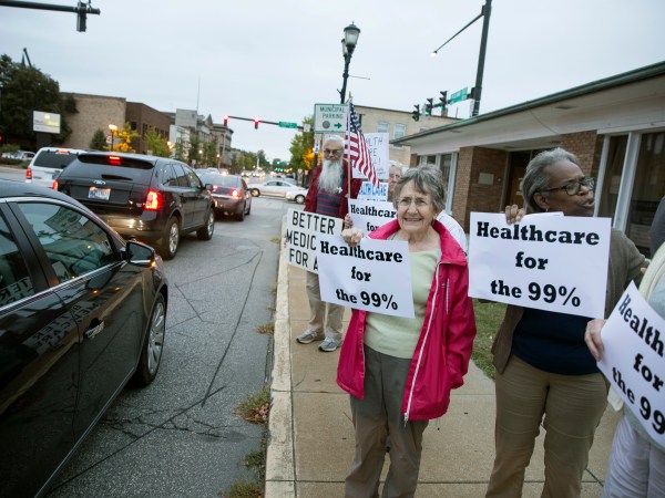 Supporters of the ACA stopped by Rep. Jackie Walorski's office to protest her support repeal and replace Wednesday, Sept. 27, 2017, in Mishawaka, Ind. (Santiago Flores/South Bend Tribune via AP)
