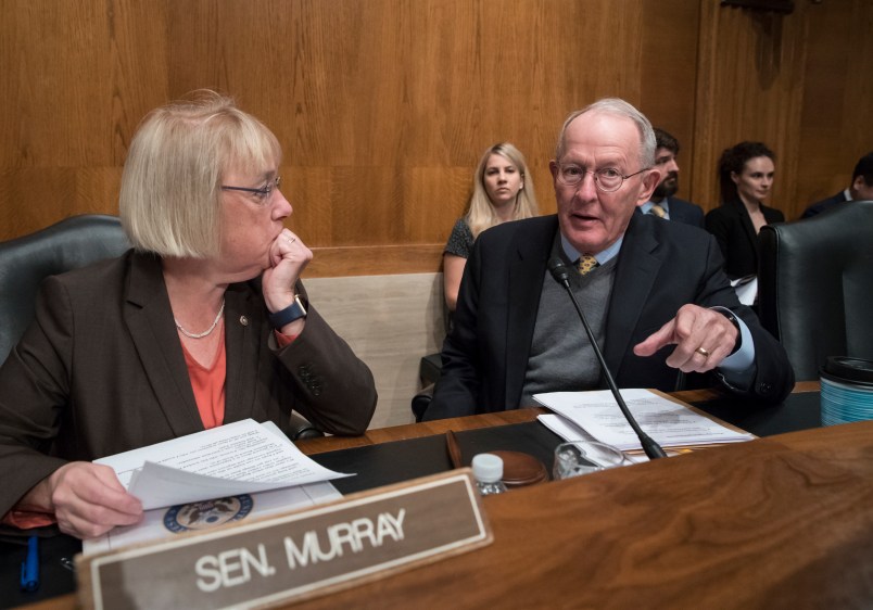 Sen. Patty Murray, D-Wash., the ranking member, and Sen. Lamar Alexander, R-Tenn., chairman of the Senate Health, Education, Labor, and Pensions Committee, meet before the start of a hearing on Capitol Hill in Washington, Wednesday, Oct. 18, 2017, the morning after they reached a deal to resume federal payments to health insurers that President Donald Trump had halted. Sen. Alexander says Trump called him Wednesday morning "to be encouraging" of bipartisan efforts to come up with a plan to stabilize health insurance premiums.   (AP Photo/J. Scott Applewhite)