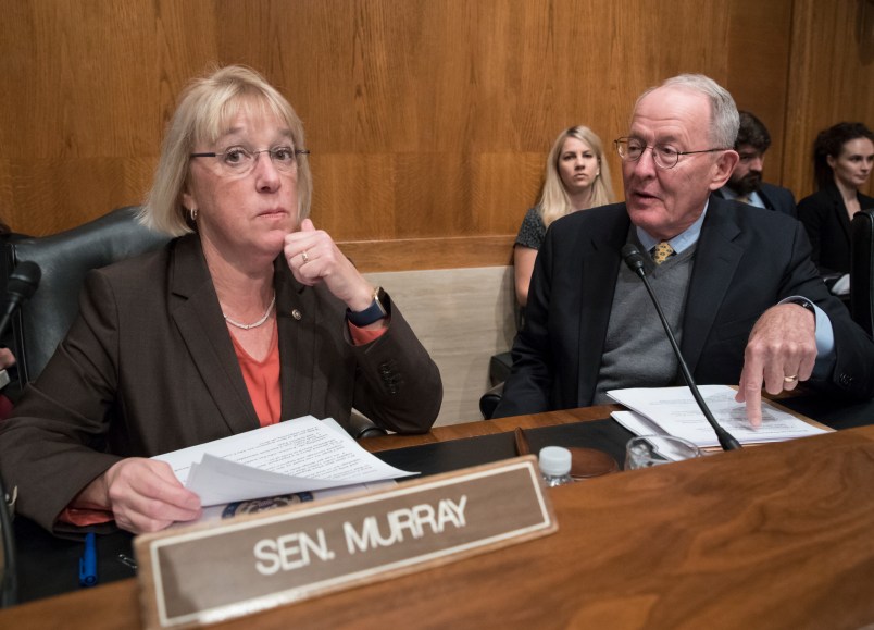 Sen. Patty Murray, D-Wash., the ranking member, and Sen. Lamar Alexander, R-Tenn., chairman of the Senate Health, Education, Labor, and Pensions Committee, meet before the start of a hearing on Capitol Hill in Washington, Wednesday, Oct. 18, 2017, the morning after they reached a deal to resume federal payments to health insurers that President Donald Trump had halted. Sen. Alexander says Trump called him Wednesday morning "to be encouraging" of bipartisan efforts to come up with a plan to stabilize health insurance premiums.   (AP Photo/J. Scott Applewhite)