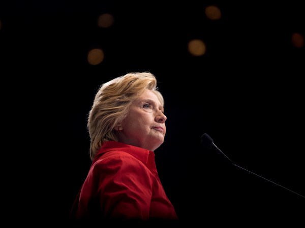Democratic presidential candidate Hillary Clinton pauses while speaking at a rally at David L. Lawrence Convention in Pittsburgh, Saturday, July 30, 2016. Clinton and Kaine are on a three day bus tour through the rust belt. (AP Photo/Andrew Harnik)