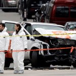 Law enforcement personnel examine the scene of a damaged Home Depot truck near the World Trade Center Memorial, Wednesday,  Nov. 1, 2017 in New York. (AP Photo/Mark Lennihan)