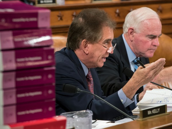 Rep. Jim Renacci, R-Ohio, joined at right by Rep. Pat Meehan, R-Pa., makes a point as the House Ways and Means Committee continues its debate over the Republican tax reform package, on Capitol Hill in Washington, Wednesday, Nov. 8, 2017. (AP Photo/J. Scott Applewhite)