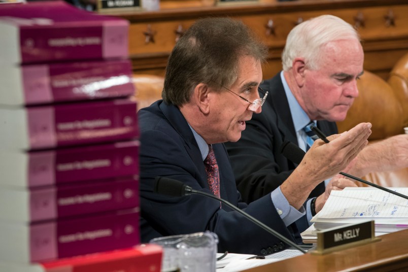 Rep. Jim Renacci, R-Ohio, joined at right by Rep. Pat Meehan, R-Pa., makes a point as the House Ways and Means Committee continues its debate over the Republican tax reform package, on Capitol Hill in Washington, Wednesday, Nov. 8, 2017. (AP Photo/J. Scott Applewhite)
