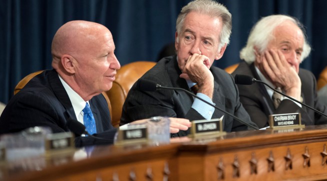 House Ways and Means Committee Chairman Kevin Brady, R-Texas, left, joined by Rep. Richard Neal, D-Mass., the ranking member, and Rep. Sander Levin, D-Mich., offers his manager's amendment as the GOP tax bill debate enters the final stage, on Capitol Hill in Washington, Thursday, Nov. 9, 2017.  (AP Photo/J. Scott Applewhite)