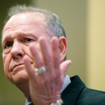 Former Alabama Chief Justice and U.S. Senate candidate Roy Moore speaks at the Vestavia Hills Public library, Saturday, Nov. 11, 2017, in Birmingham, Ala. According to a Washington Post story Nov. 9, an Alabama woman said Moore made inappropriate advances and had sexual contact with her when she was 14. (AP Photo/Brynn Anderson)