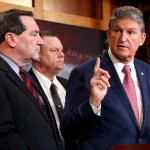 Sen. Joe Manchin, D-W.Va., right, with Sen. Joe Donnelly, D-Ind., left, and Sen. Jon Tester, D-Mont., speaks about tax reform, Tuesday, Nov. 28, 2017, on Capitol Hill in Washington. (AP Photo/Jacquelyn Martin)