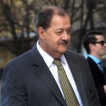 FILE - In a Wednesday, April 6, 2016, file photo, former Massey CEO Don Blankenship is escorted by Homeland Security officers from the Robert C. Byrd U.S. Courthouse in Charleston, W. Va. Attorneys for Blankenship and the federal government head to court this week in the ex-coal operator's appeal of his conviction in connection with the deadliest U.S. mine disaster in four decades. Oral arguments are scheduled for Wednesday, Oct. 26, before a three-judge panel at the 4th U.S. Circuit Court of Appeals in Richmond, Va. (F. Brian Ferguson/Charleston Gazette-Mail via AP, File)