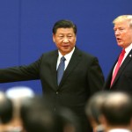 U.S. President Donald Trump (R) and China’s President Xi Jinping attend a signing ceremony of US-China Business Exchange at the Great Hall of the People in Beijing on Nov. 9, 2017.( The Yomiuri Shimbun via AP Images )