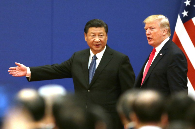 U.S. President Donald Trump (R) and China’s President Xi Jinping attend a signing ceremony of US-China Business Exchange at the Great Hall of the People in Beijing on Nov. 9, 2017.( The Yomiuri Shimbun via AP Images )