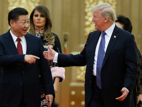 U.S. President Donald Trump and China's President Xi Jinping arrive at a state dinner at the Great Hall of the People in Beijing, China, November 9, 2017. REUTERS/Thomas Peter