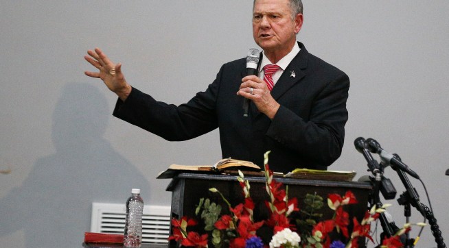 Former Alabama Chief Justice and U.S. Senate candidate Roy Moore speaks at a revival, Tuesday, Nov. 14, 2017, in Jackson, Ala. (AP Photo/Brynn Anderson)