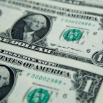 Treasury Secretary Steven Mnuchin's signatures is seen on new dollar bills, Wednesday, Nov. 15, 2017, at the Bureau of Engraving and Printing in Washington. The new Mnuchin-Carranza notes, which are a new series of 2017, 50-subject $1 notes, will be sent to the Federal Reserve to issue into circulation. (AP Photo/Jacquelyn Martin)