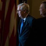 UNITED STATES - NOVEMBER 16: Senate Majority Leader Mitch McConnell, R-Ky., talks with an aide in the Capitol after the House passed the GOP's tax reform bill on November 16, 2017. (Photo By Tom Williams/CQ Roll Call)