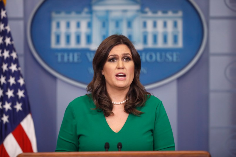 President Donald Trump and White House press secretary Sarah Huckabee Sanders speak to the media during the daily briefing in the Brady Press Briefing Room of the White House, Thursday, Nov. 16, 2017. (AP Photo/Pablo Martinez Monsivais)