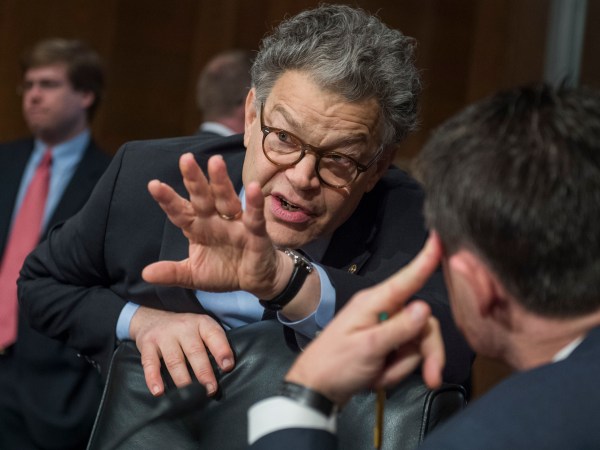 UNITED STATES - OCTOBER 19: Sen. Al Franken, D-Minn., left, talks with Sen. Todd Young, R-Ind., during a Senate Health, Education, Labor and Pensions Committee hearing in Dirksen Building titled "Examining How Healthy Choices Can Improve Health Outcomes and Reduce Costs," on October 19, 2017. (Photo By Tom Williams/CQ Roll Call)