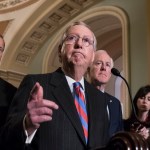 With the deadline looming to pass a spending bill to fund the government by week's end, Senate Majority Leader Mitch McConnell, R-Ky., joined by, from left, Sen. John Thune, R-S.D., and Majority Whip John Cornyn, R-Texas, meets reporters following a closed-door strategy session, on Capitol Hill in Washington, Tuesday, Dec. 5, 2017.  (AP Photo/J. Scott Applewhite)