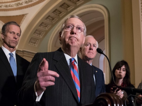 With the deadline looming to pass a spending bill to fund the government by week's end, Senate Majority Leader Mitch McConnell, R-Ky., joined by, from left, Sen. John Thune, R-S.D., and Majority Whip John Cornyn, R-Texas, meets reporters following a closed-door strategy session, on Capitol Hill in Washington, Tuesday, Dec. 5, 2017.  (AP Photo/J. Scott Applewhite)