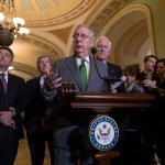 Senate Majority Leader Mitch McConnell, R-Ky., center, joined by, from left, Sen. John Thune, R-S.D., Sen. Cory Gardner, R-Colo., Sen. Roy Blunt, R-Mo., and Majority Whip John Cornyn, R-Texas, speaks to reporters about the GOP tax bill following a closed-door strategy session on Capitol Hill in Washington, Tuesday, Dec. 12, 2017.  (AP Photo/J. Scott Applewhite)