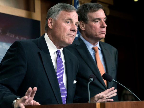 Senate Select Committee on Intelligence Chairman Richard Burr, R-N.C., left, and Vice Chairman Mark Warner, D-Va., update reporters on the status of their inquiry into Russian interference in the 2016 U.S. elections, at the Capitol in Washington, Wednesday, Oct. 4, 2017. Burr says the committee has interviewed more than 100 witnesses as part of its investigation and that more work still needs to be done. (AP Photo/J. Scott Applewhite)