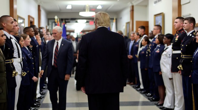 President Donald Trump and Vice President Mike Pence greet military personnel during their visit to the Pentagon, Thursday, July 20, 2017. (AP Photo/Pablo Martinez Monsivais)