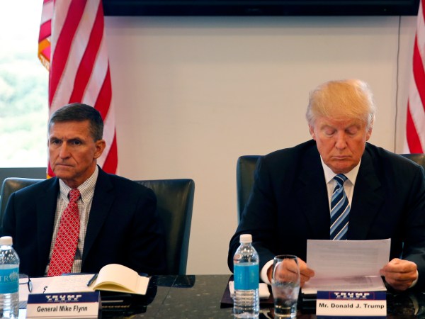 Republican presidential candidate Donald Trump, conducts a roundtable discussion on national security in his offices in Trump Tower in New York, Wednesday, Aug. 17, 2016. Left is Ret. Army Gen. Mike Flynn and right is Ret. Army Lt. Gen. Keith Kellogg. (AP Photo/Gerald Herbert)