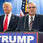 FILE - In this Jan. 26, 2016, file photo, then-Republican presidential candidate Donald Trump is joined by Joe Arpaio, the then sheriff of metro Phoenix, during a news conference in Marshalltown, Iowa. The former Phoenix-area sheriff who was pardoned by President Donald Trump from his federal contempt-of-court conviction in an immigration case is experiencing a wobbly return to the public speaking circuit.In Las Vegas, security concerns prompted event planners to move Arpaio’s scheduled weekend appearance to an undisclosed location away from the casino-lined Strip tourist district. (AP Photo/Mary Altaffer, File)