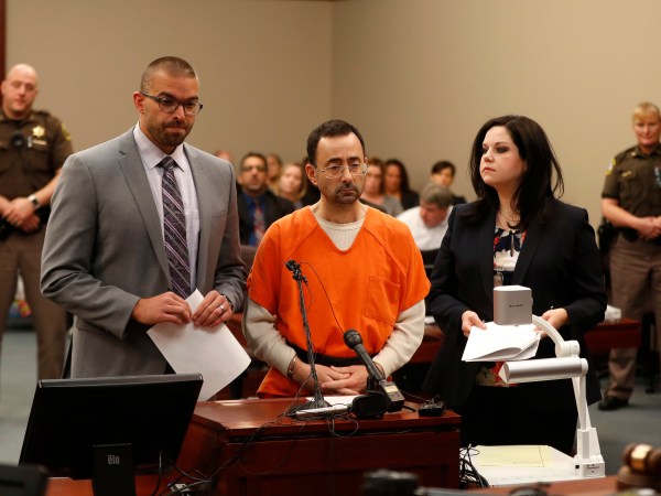 Dr. Larry Nassar, 54, appears in court for a plea hearing in Lansing, Mich., Wednesday, Nov. 22, 2017. Nasser, a sports doctor accused of molesting girls while working for USA Gymnastics and Michigan State University pleaded, guilty to multiple charges of sexual assault and will face at least 25 years in prison.(AP Photo/Paul Sancya)