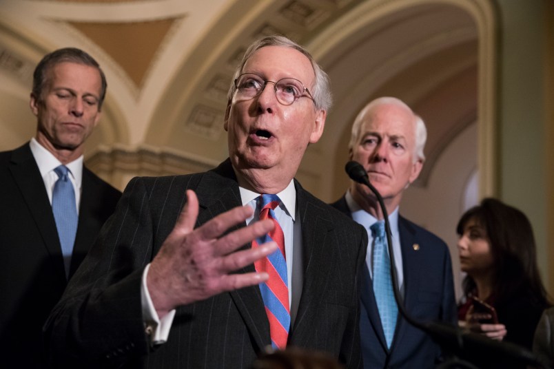With the deadline looming to pass a spending bill to fund the government by week's end, Senate Majority Leader Mitch McConnell, R-Ky., joined by, from left, Sen. Roy Blunt, R-Mo., Sen. John Thune, R-S.D., and Majority Whip John Cornyn, R-Texas, meets reporters following a closed-door strategy session, on Capitol Hill in Washington, Tuesday, Dec. 5, 2017.  (AP Photo/J. Scott Applewhite)