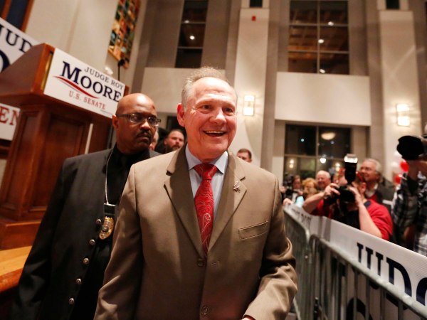 U.S. Senate candidate Roy Moore greets supporters during an election-night watch party at the RSA activity center, Tuesday, Dec. 12, 2017, in Montgomery, Ala. (AP Photo/Brynn Anderson)