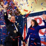 Democratic candidate for U.S. Senate Doug Jones and his wife Louise wave to supporters before speaking during an election-night watch party Tuesday, Dec. 12, 2017, in Birmingham , Ala. Jones is facing Republican Roy Moore. (AP Photo/John Bazemore)