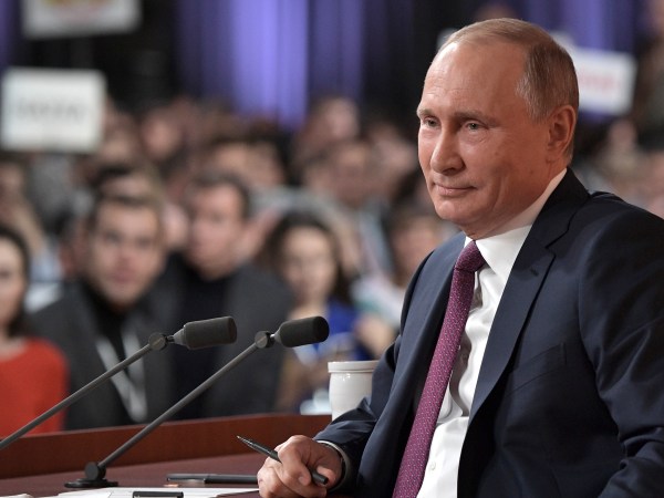 Russian President Vladimir Putin smiles during his annual news conference in Moscow, Russia, Thursday, Dec. 14, 2017. (Alexei Nikolsky, Sputnik, Kremlin Pool Photo via AP)