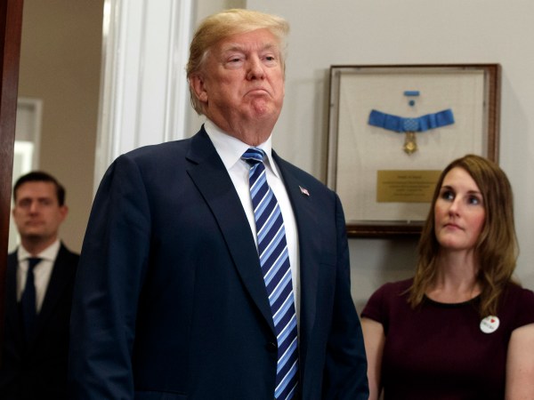 President Donald Trump pauses as he speaks to reporters during an event on federal regulations in the Roosevelt Room of the White House, Thursday, Dec. 14, 2017, in Washington. (AP Photo/Evan Vucci)