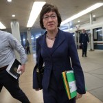 Sen. Susan Collins, R-Maine, arrives for a caucus meeting as the Republican majority in Congress prepares to vote on the biggest reshaping of the U.S. tax code in three decades, on Capitol Hill, in Washington, Tuesday, Dec. 19, 2017. (AP Photo/J. Scott Applewhite)