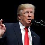 President Donald Trump participates in the FBI National Academy graduation ceremony, Friday, Dec. 15, 2017, in Quantico, Va. (AP Photo/Evan Vucci)