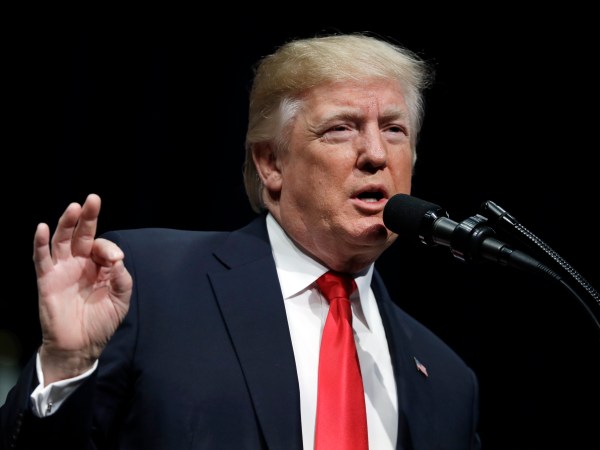 President Donald Trump participates in the FBI National Academy graduation ceremony, Friday, Dec. 15, 2017, in Quantico, Va. (AP Photo/Evan Vucci)