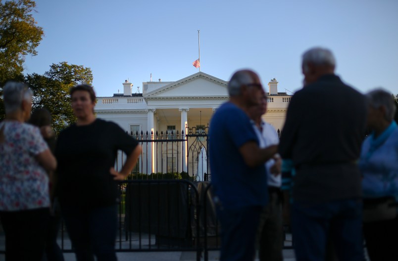 The U.S. flag is seen lowered to half staff above the White House in Washington, Monday, Oct. 2, 2017. President Donald Trump ordered that flags be lowered at all government buildings to honor the victims of a mass shooting in the Las Vegas attacks. (AP Photo/Pablo Martinez Monsivais)