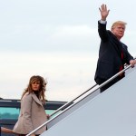 President Donald Trump and first lady Melania Trump board Air Force One at Palm Beach International Airport, Monday, Jan. 1, 2018, in West Palm Beach, Fla. (AP Photo/Evan Vucci)