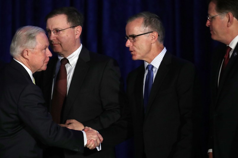 U.S. Attorney General Jeff Sessions and Deputy Attorney General Rod Rosenstein address the National Summit on Crime Reduction and Public Safety at the Hyatt Regency hotel June 20, 2017 in Bethesda, Maryland. Attorney General Jeff Sessions has recused himself from the Justice Department's investigation into Russian involvement in the 2016 presidential election, when he served as an advisor to the campaign of President Donlad Trump. Rosenstein took over the  Justice Department's investigation into Russian involvement in the 2016 presidential election after Attorney General Jeff Sessions recused himself due to his involvement in the Trump campaign.