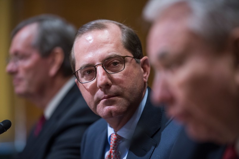 UNITED STATES - JANUARY 09: Tommy Thompson, right, former Health and Human Services secretary, introduces Alex Azar, center, nominee to be HHS secretary, during Azar's Senate Finance Committee confirmation hearing in Dirksen Building on January 9, 2018. Mike Leavitt, former HHS secretary, appears at far left. (Photo By Tom Williams/CQ Roll Call)